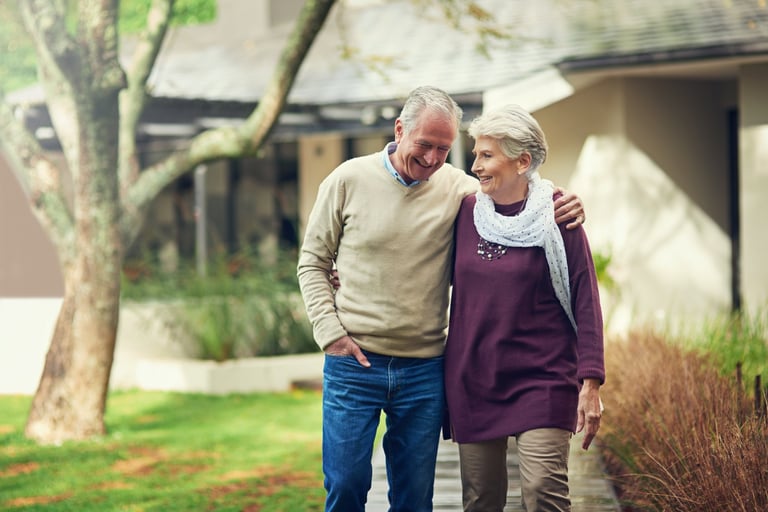 Shot of a loving senior couple taking a walk outside